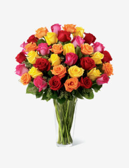 Arreglo de Rosas de Colores en Florero de Cristal – Variedad Premium